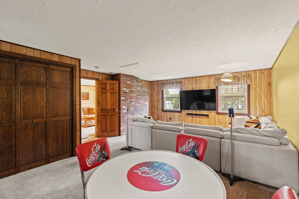 1 Robbin Road Canton, MA 02021 - Photo 19 of 40 a view of a livingroom with workspace and a couch