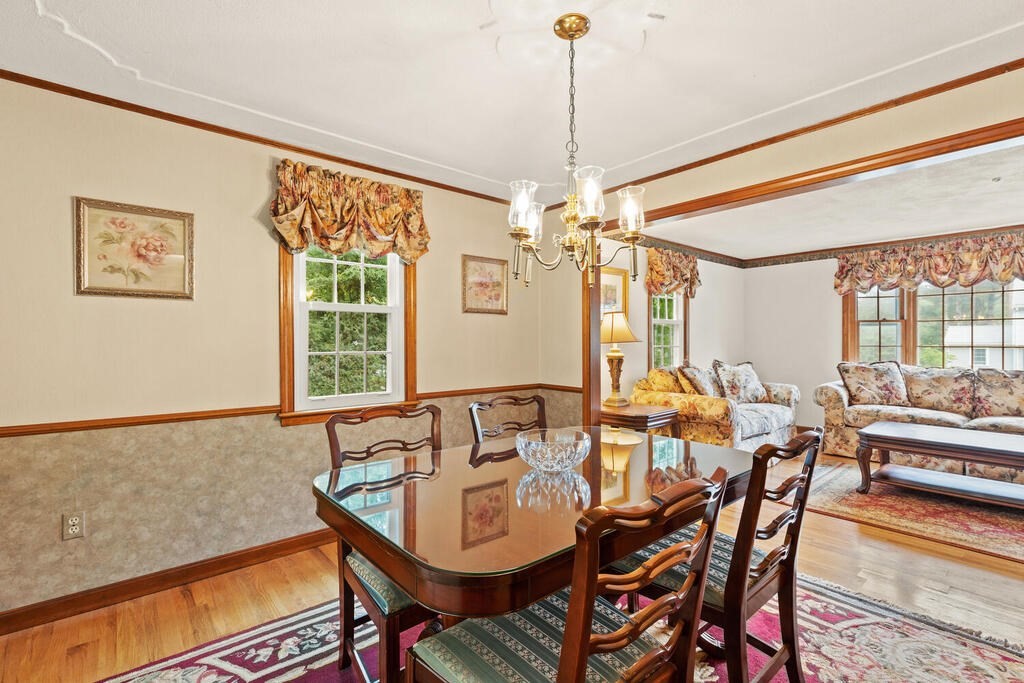 1 Robbin Road Canton, MA 02021 - Photo 22 of 40 a view of a dining room with furniture window and outside view