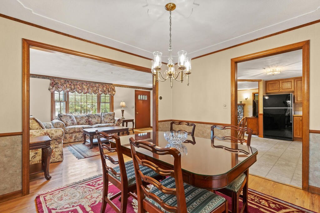 1 Robbin Road Canton, MA 02021 - Photo 23 of 40 a view of a dining room with furniture window and outside view