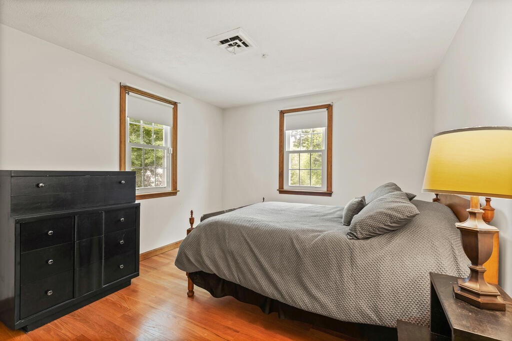 1 Robbin Road Canton, MA 02021 - Photo 31 of 40 a bedroom with a bed and a window