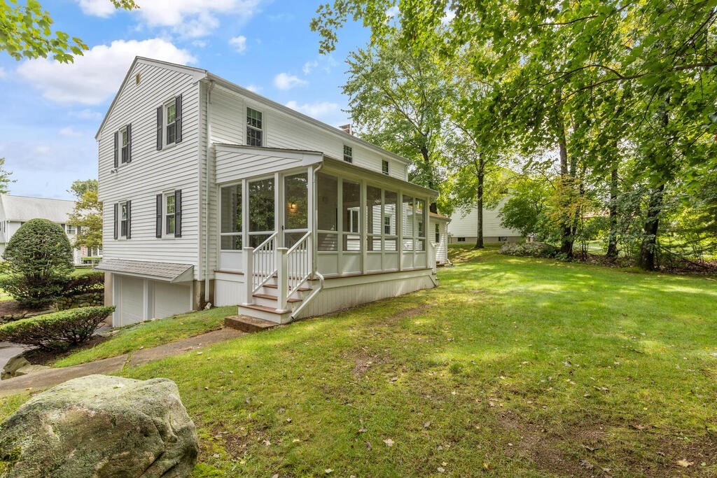 1 Robbin Road Canton, MA 02021 - Photo 39 of 40 a front view of a house with a yard