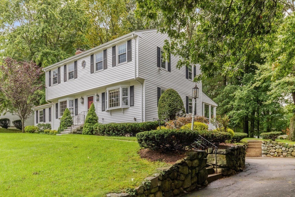 1 Robbin Road Canton, MA 02021 - Photo 4 of 40 a front view of house with yard and green space