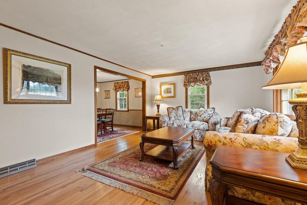 1 Robbin Road Canton, MA 02021 - Photo 9 of 40 a living room with furniture and a rug