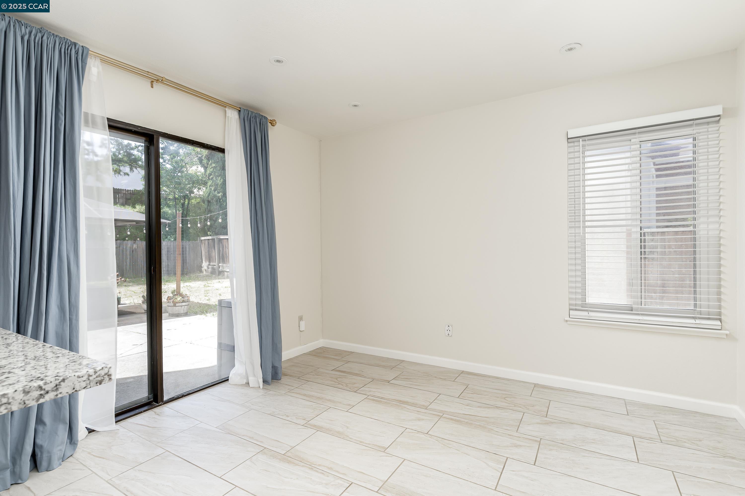 121 Brighton Street Hercules, CA 94547 - Photo 20 of 55 a view of an empty room with a window