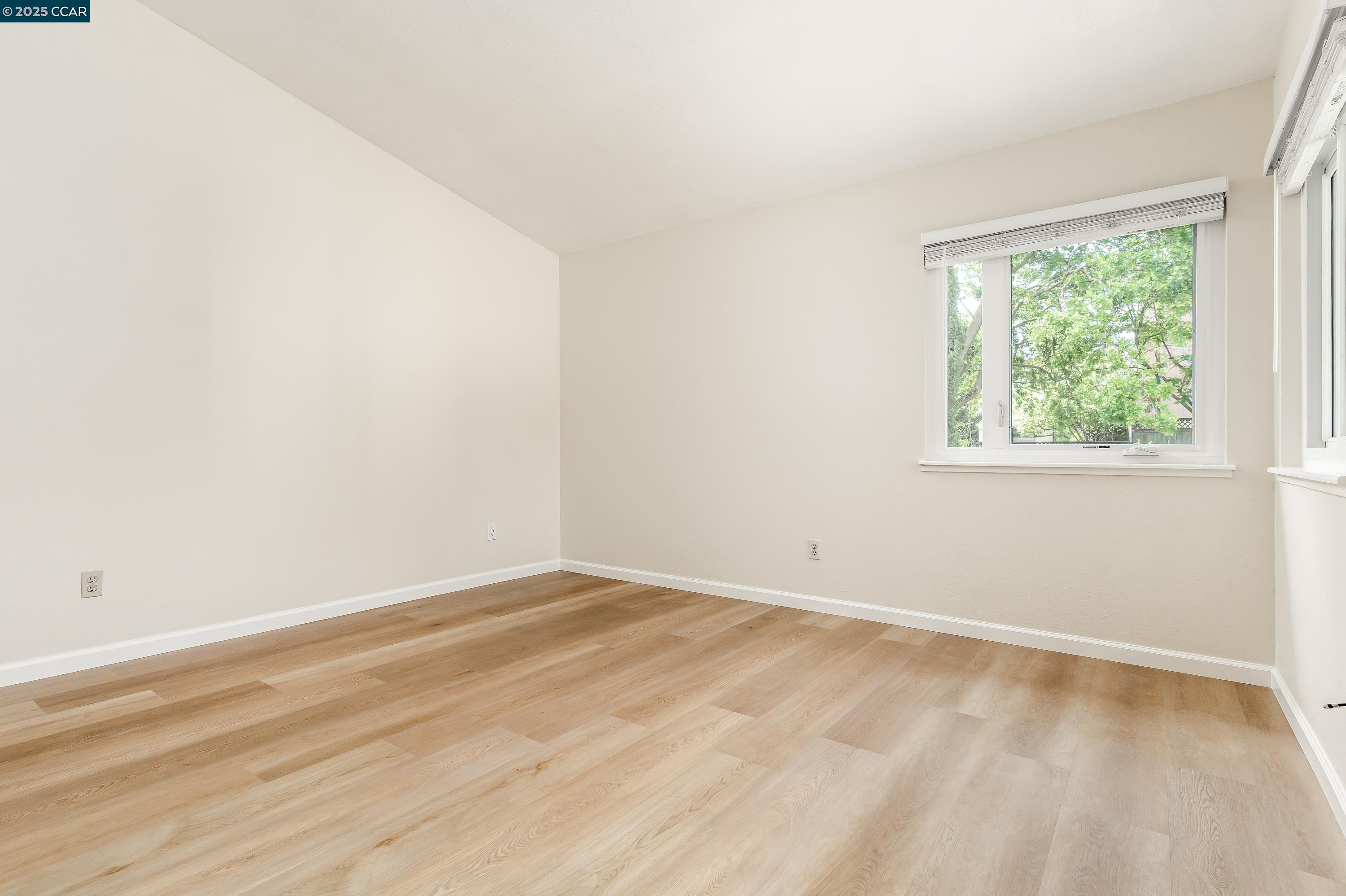 121 Brighton Street Hercules, CA 94547 - Photo 22 of 55 an empty room with a window