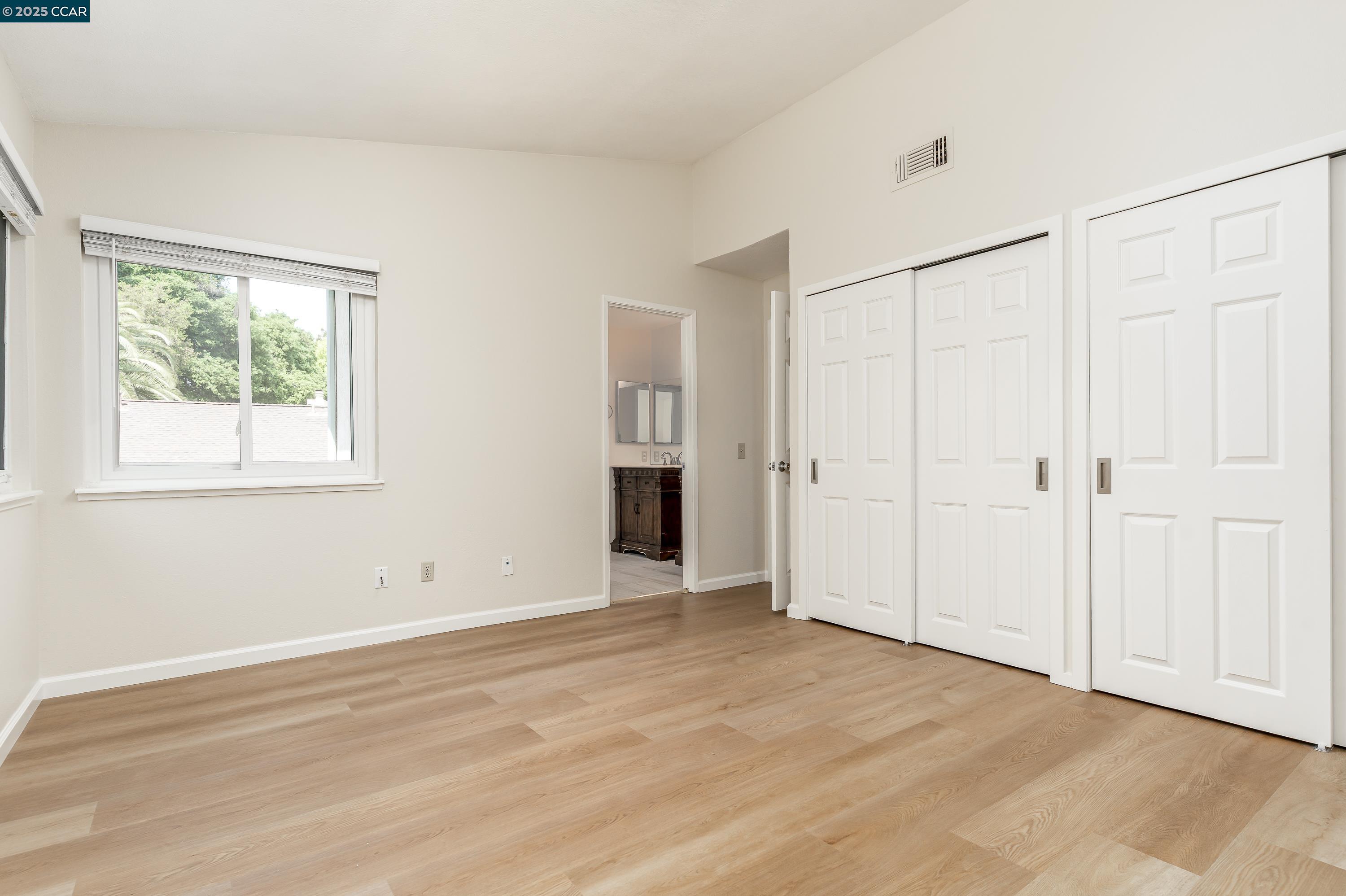 121 Brighton Street Hercules, CA 94547 - Photo 25 of 55 an empty room with windows and closet