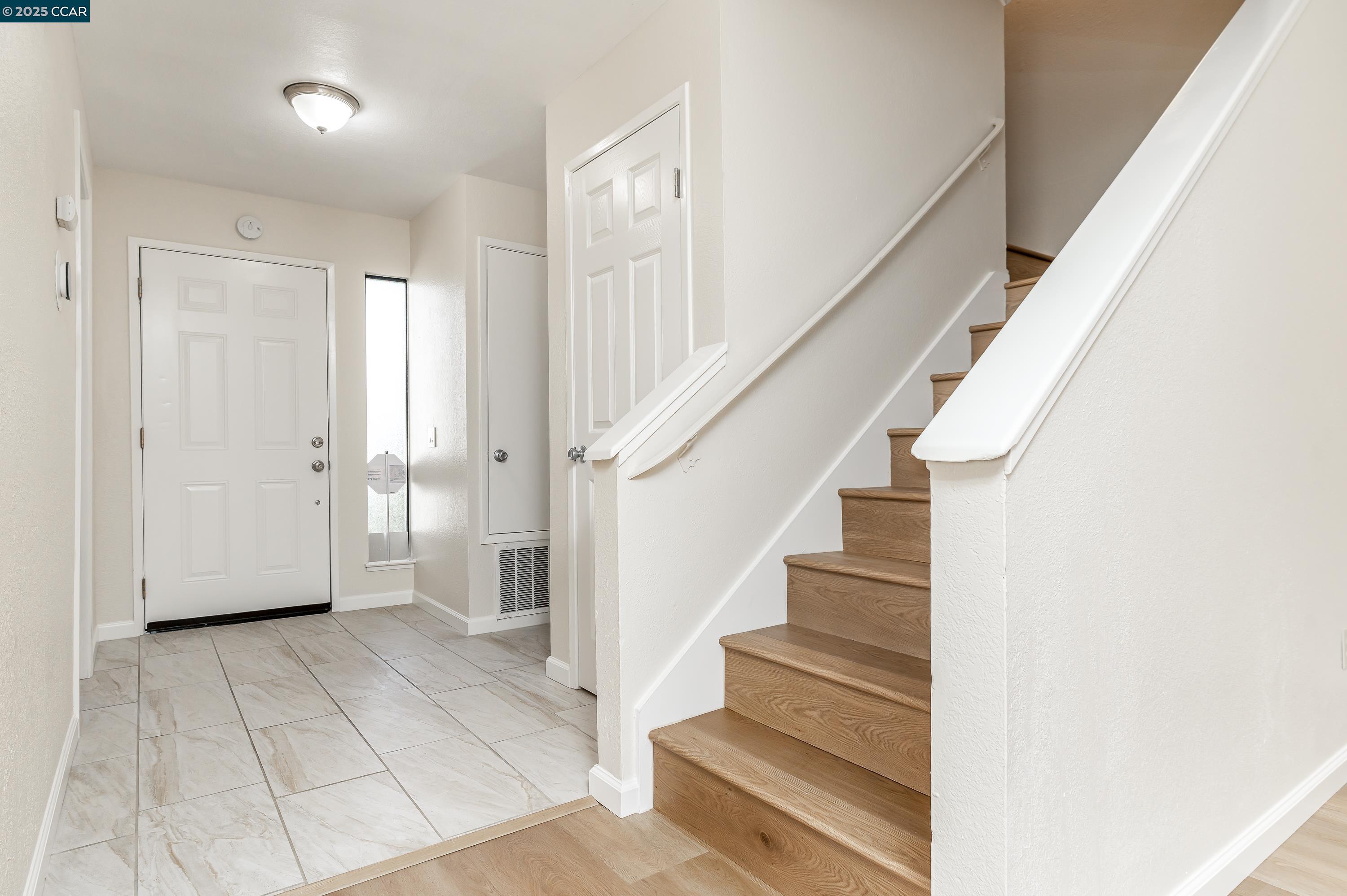 121 Brighton Street Hercules, CA 94547 - Photo 3 of 55 a view of entryway and hall with wooden floor