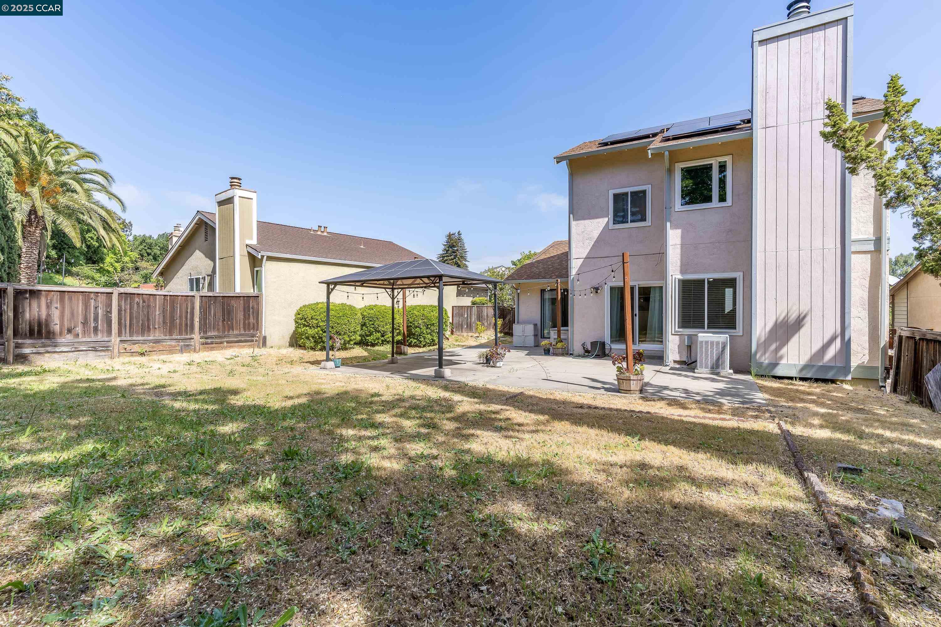 121 Brighton Street Hercules, CA 94547 - Photo 44 of 55 a view of a house with a yard