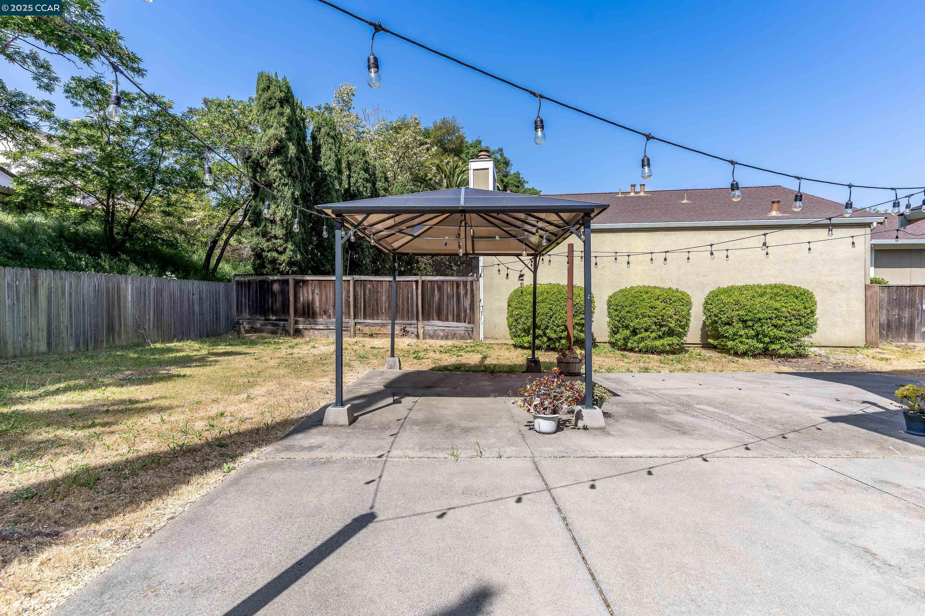 121 Brighton Street Hercules, CA 94547 - Photo 46 of 55 a view of a backyard with sitting area