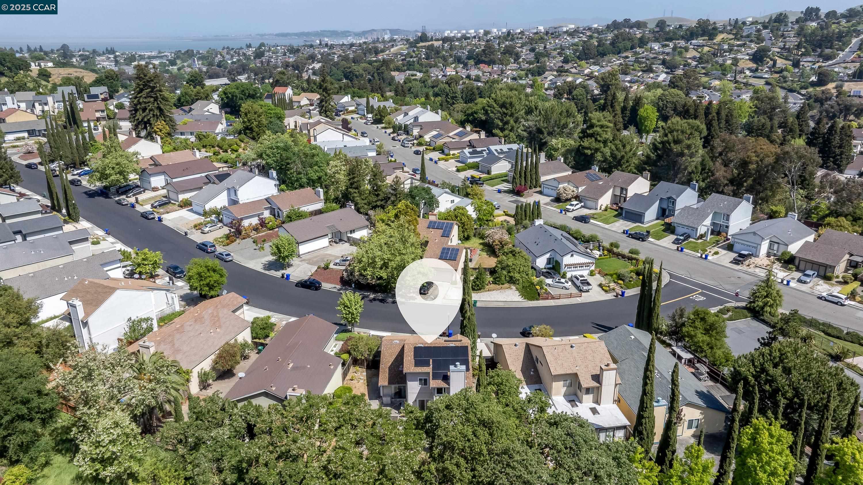 121 Brighton Street Hercules, CA 94547 - Photo 51 of 55 an aerial view of a house with swimming pool outdoor seating and mountain view