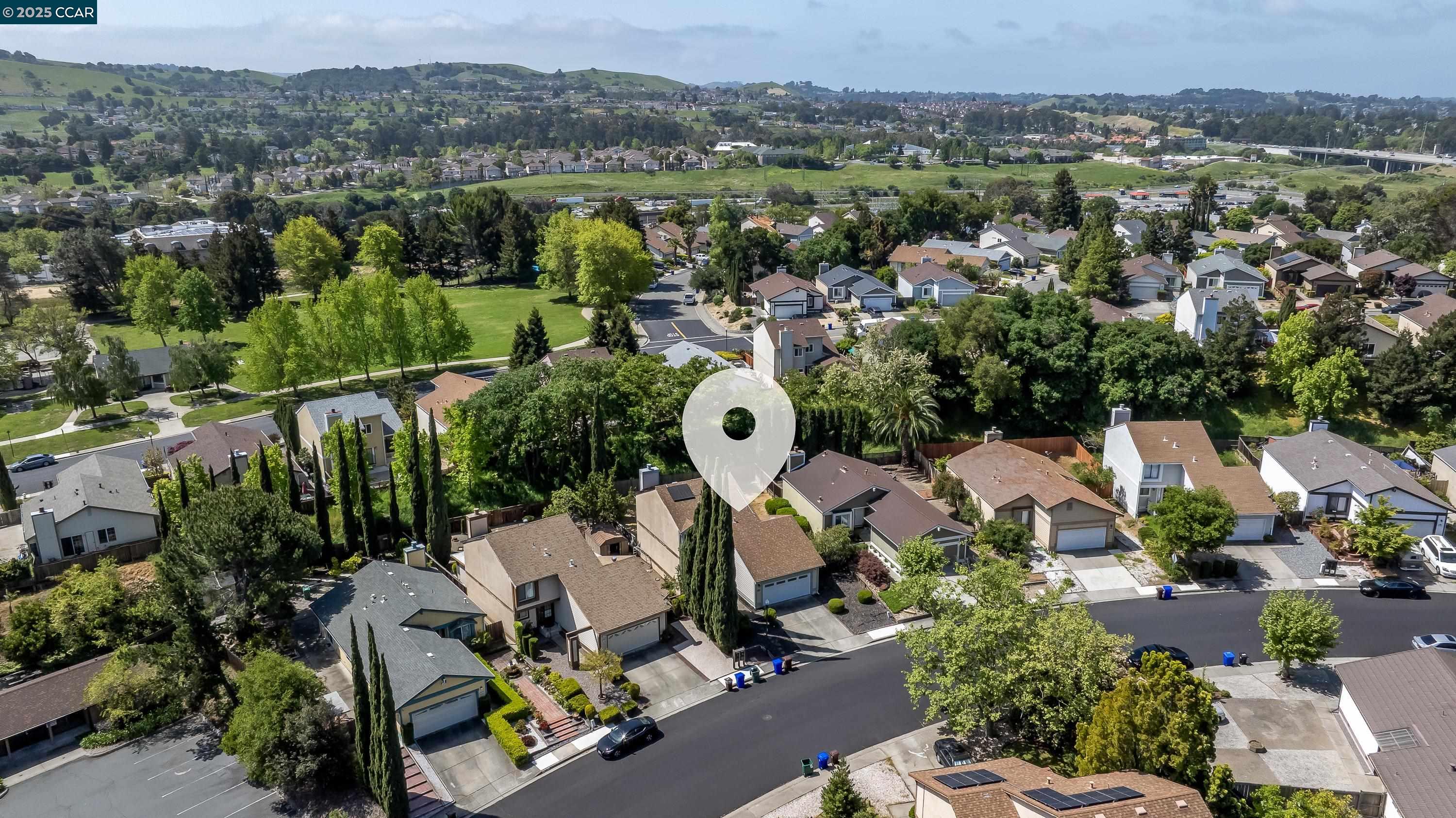 121 Brighton Street Hercules, CA 94547 - Photo 53 of 55 a view of a house with a swimming pool and a yard