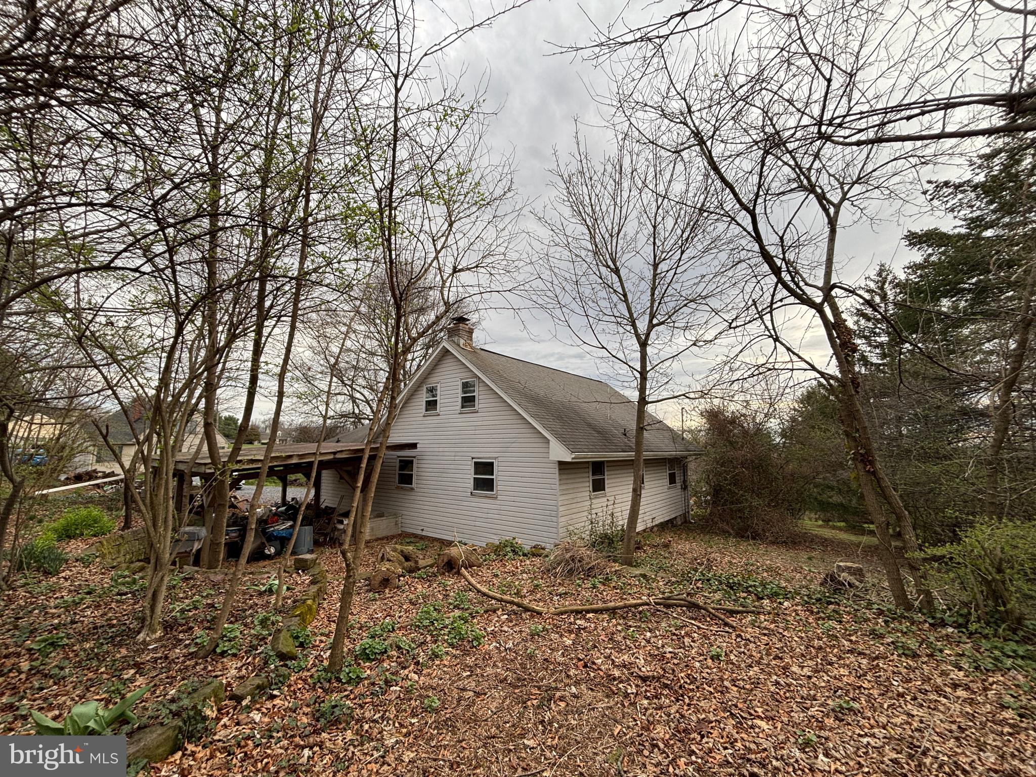 39 Hossler Road Manheim, PA 17545 - Photo 8 of 16 a view of a house with a yard and large trees