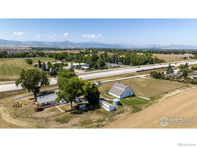 a view of a swimming pool and an outdoor space