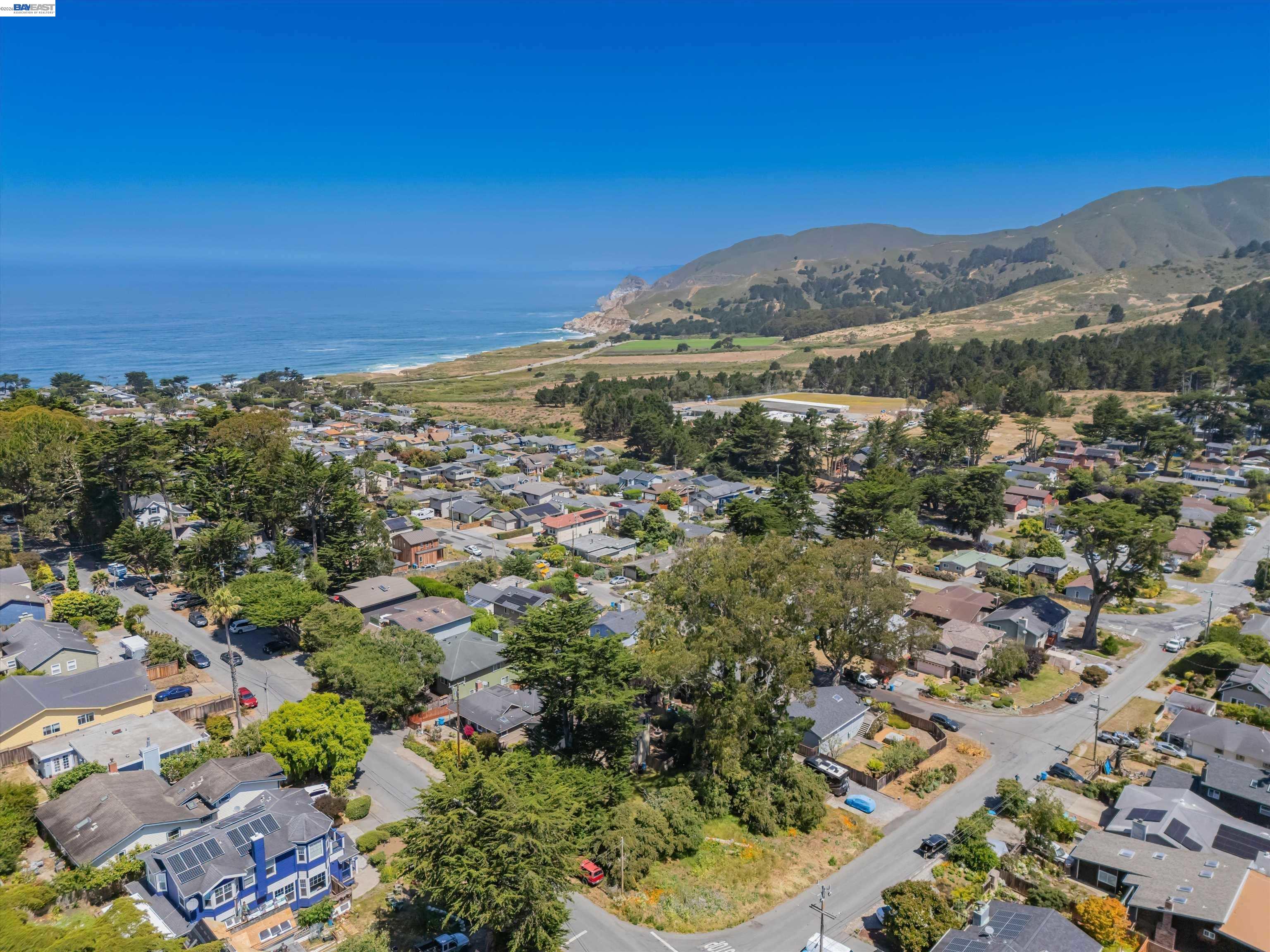 0 6th Street Montara, CA 94037 - Photo 10 of 11 a view of a city with mountains in the background