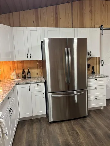 a kitchen with sink and window