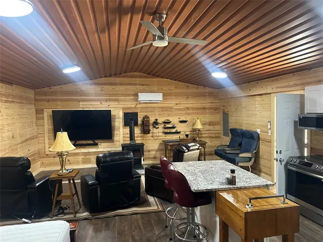 a black and white wall with a fireplace