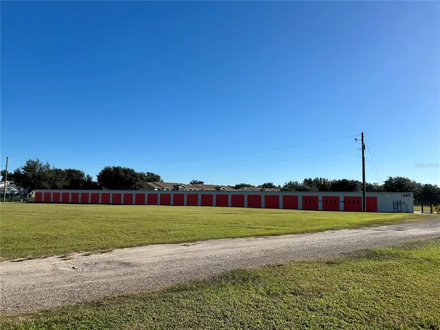 a view of a ocean with a palm trees