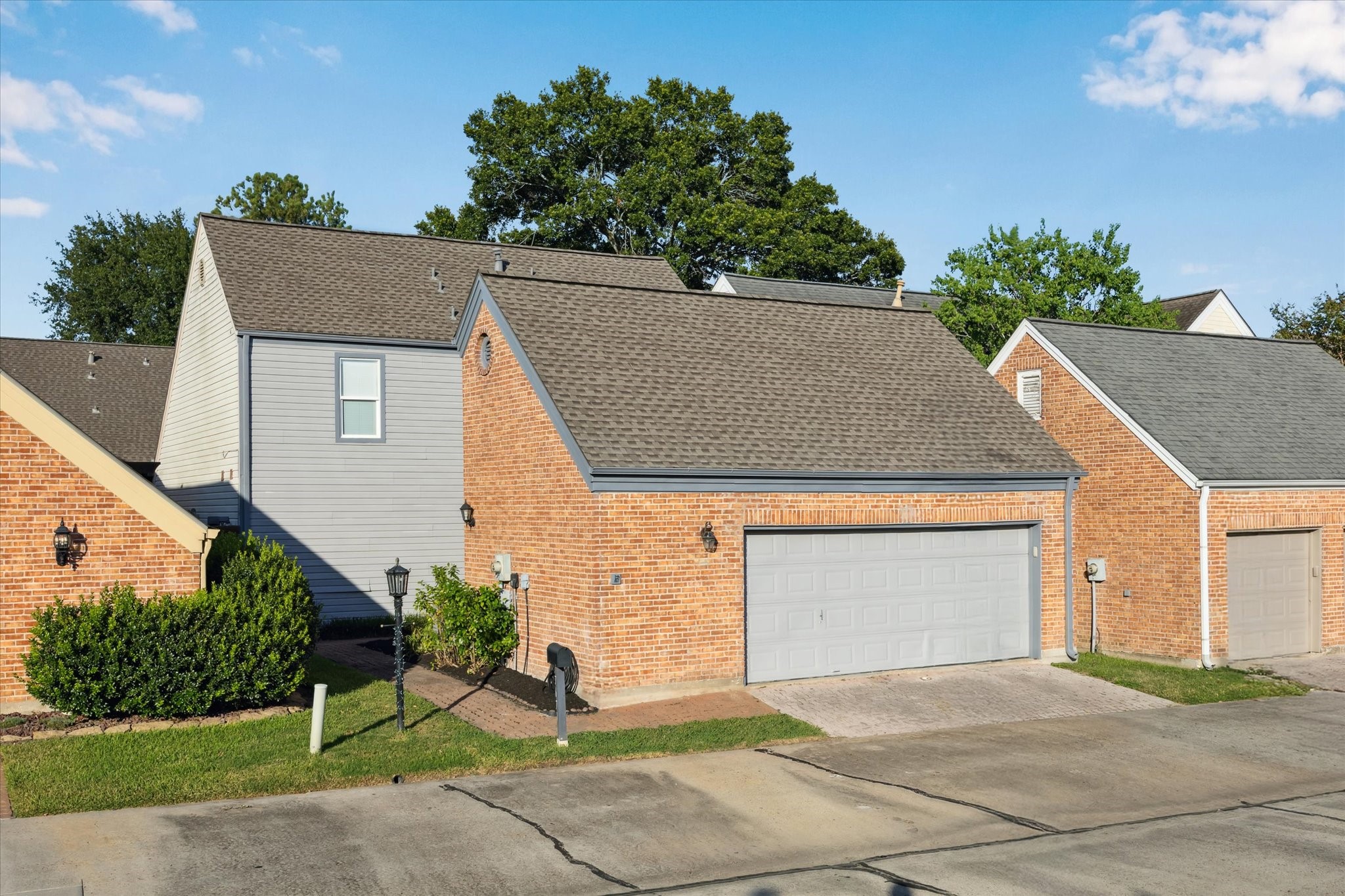 7671 Ameswood Road Houston, TX 77095 - Photo 3 of 23 This Frestanding Patio Home has an oversized garage with room for a golf cart and areas for work and storage.