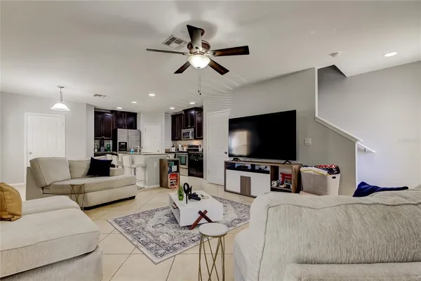 a living room with furniture and a window