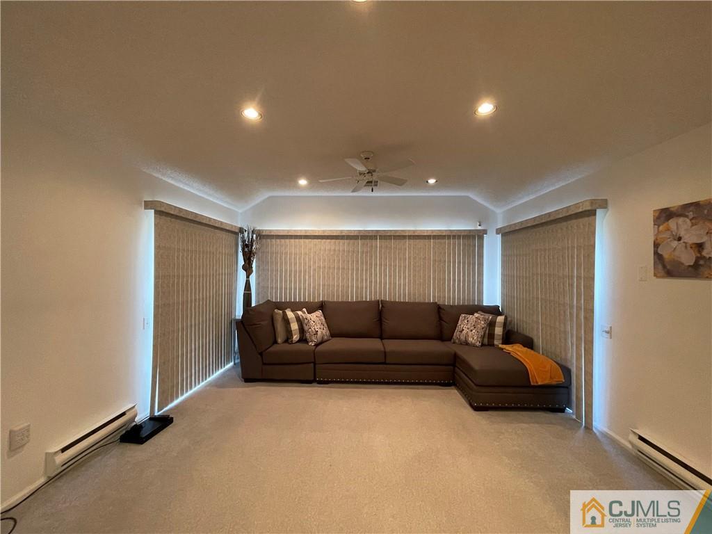 656 Nutley Drive, Unit A Monroe Township, NJ 08831 - Photo 16 of 25 a living room with furniture and a couch