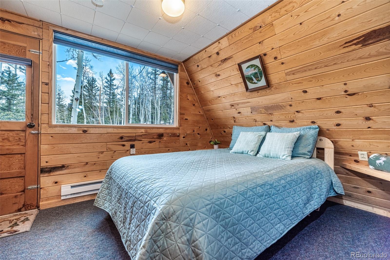 340 Wampum Lane Como, CO 80456 - Photo 19 of 35 a bedroom with a bed and window