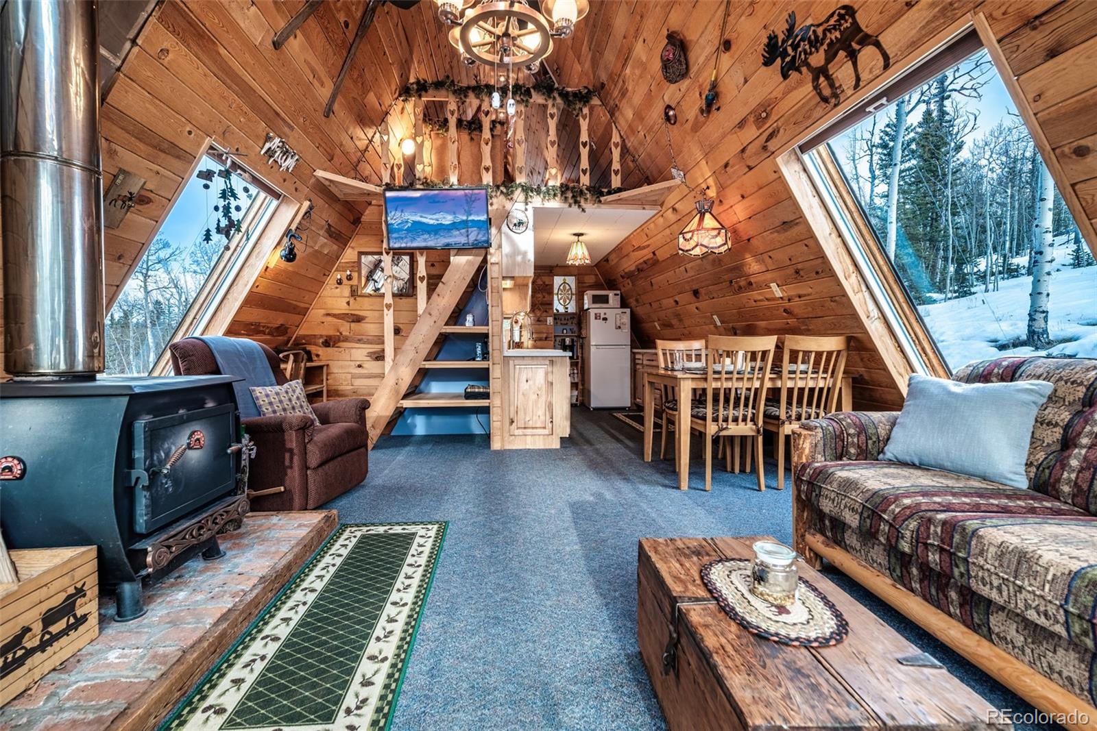 340 Wampum Lane Como, CO 80456 - Photo 7 of 35 a living room with furniture and a rug