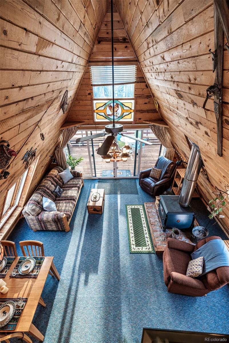 340 Wampum Lane Como, CO 80456 - Photo 8 of 35 a view of a room with wooden floor and furniture