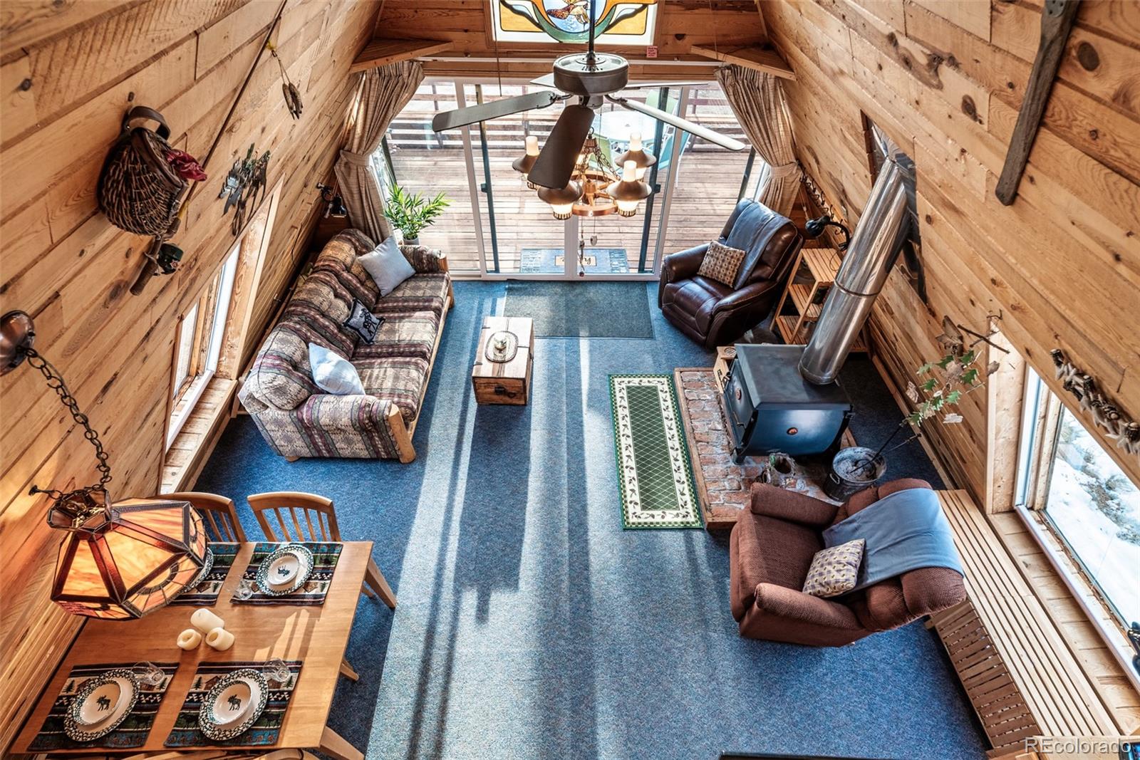 340 Wampum Lane Como, CO 80456 - Photo 9 of 35 view of living room with furniture and wooden floor