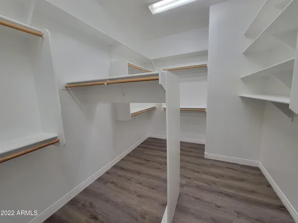 a view of an empty walk in closet