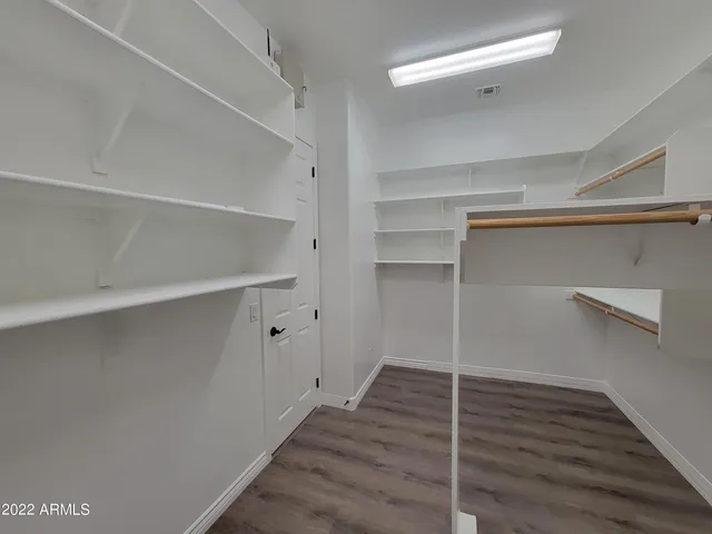 a view of an empty walk in closet