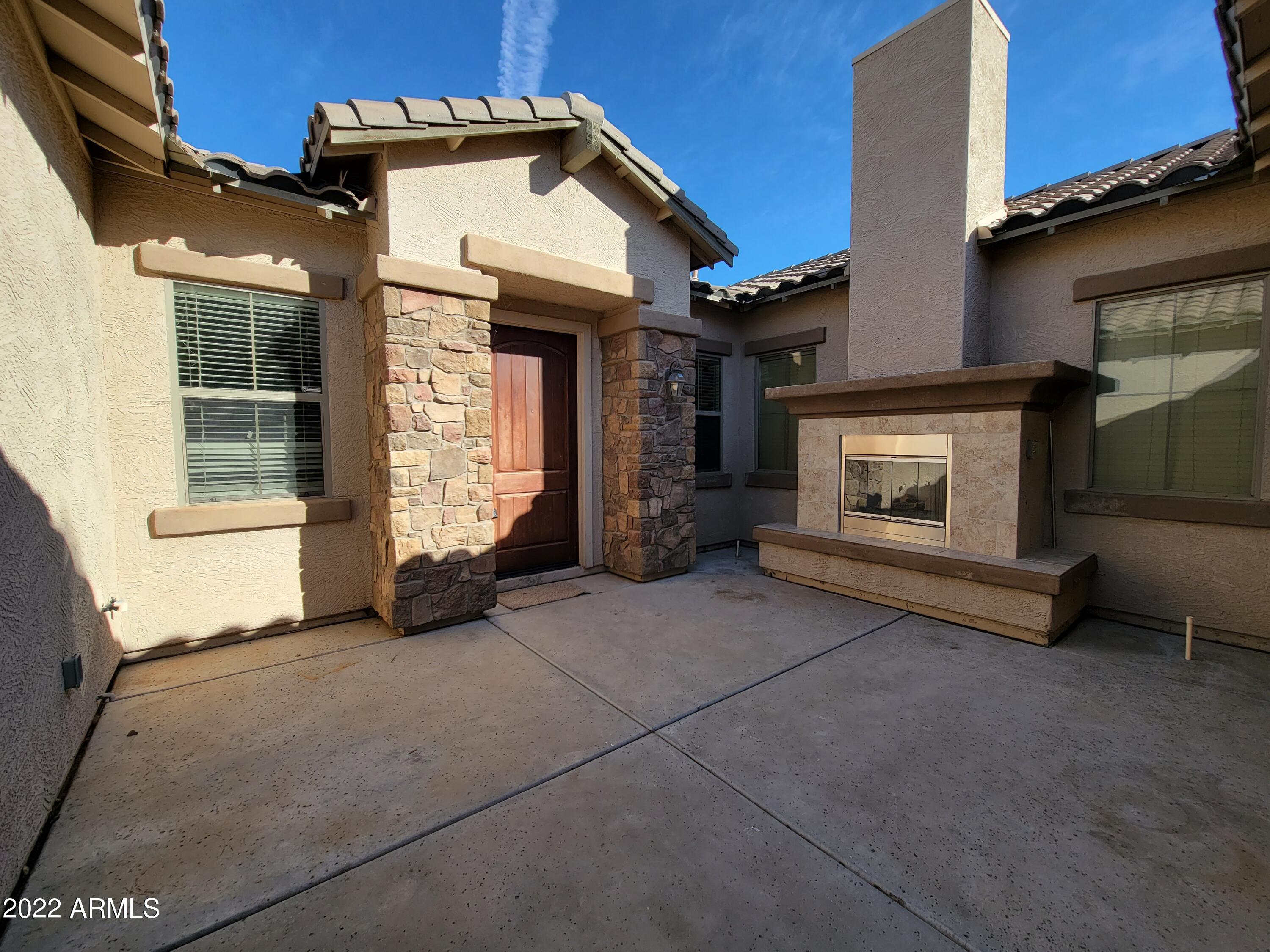 6335 South Roanoke Street Gilbert, AZ 85298 - Photo 2 of 36 a view of house and outdoor space