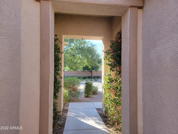 a view of a porch of a house