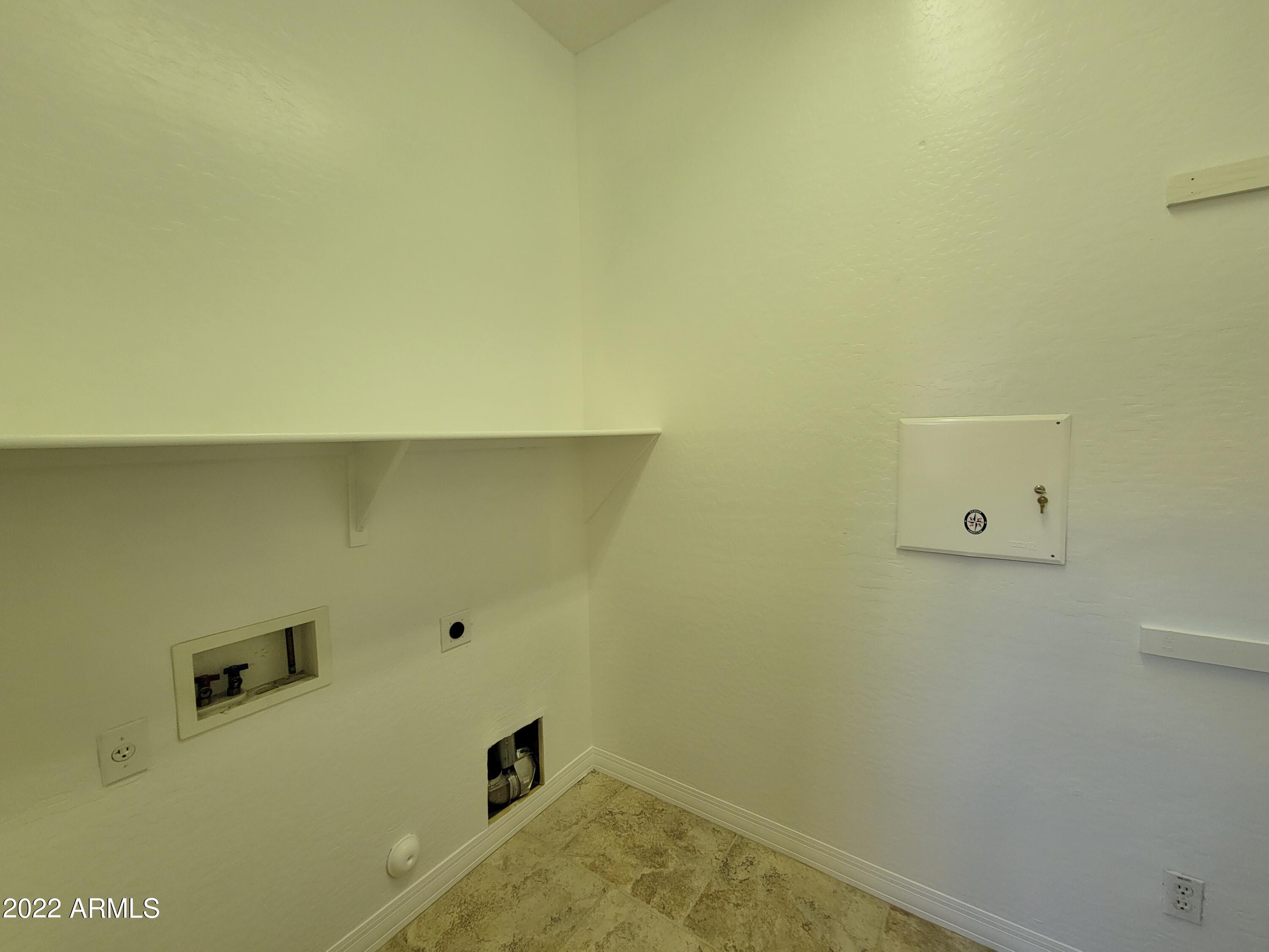 6335 South Roanoke Street Gilbert, AZ 85298 - Photo 32 of 36 a view of a closet