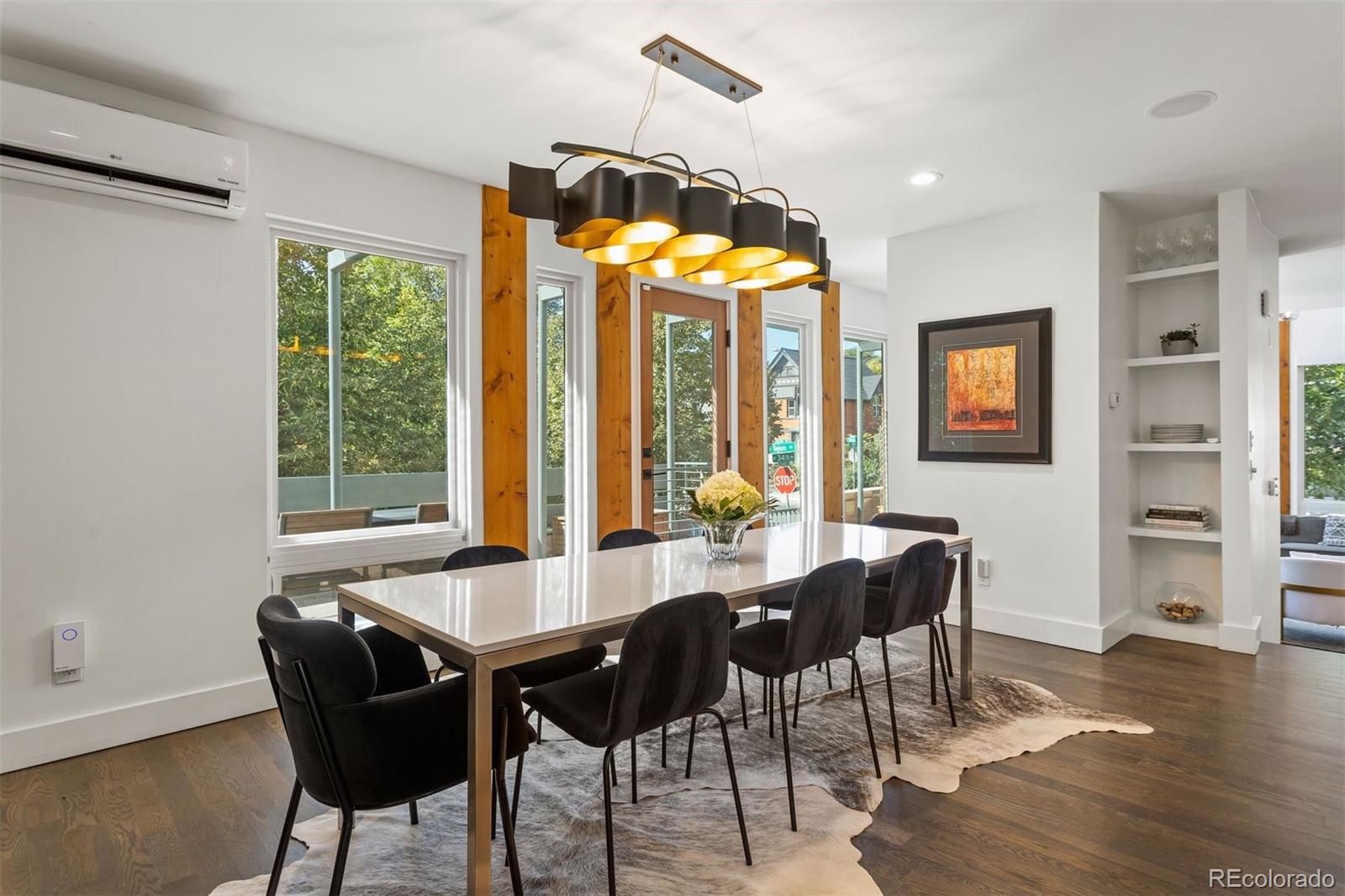 3400 Tejon Street Denver, CO 80211 - Photo 14 of 40 a view of a dining room with furniture window and wooden floor