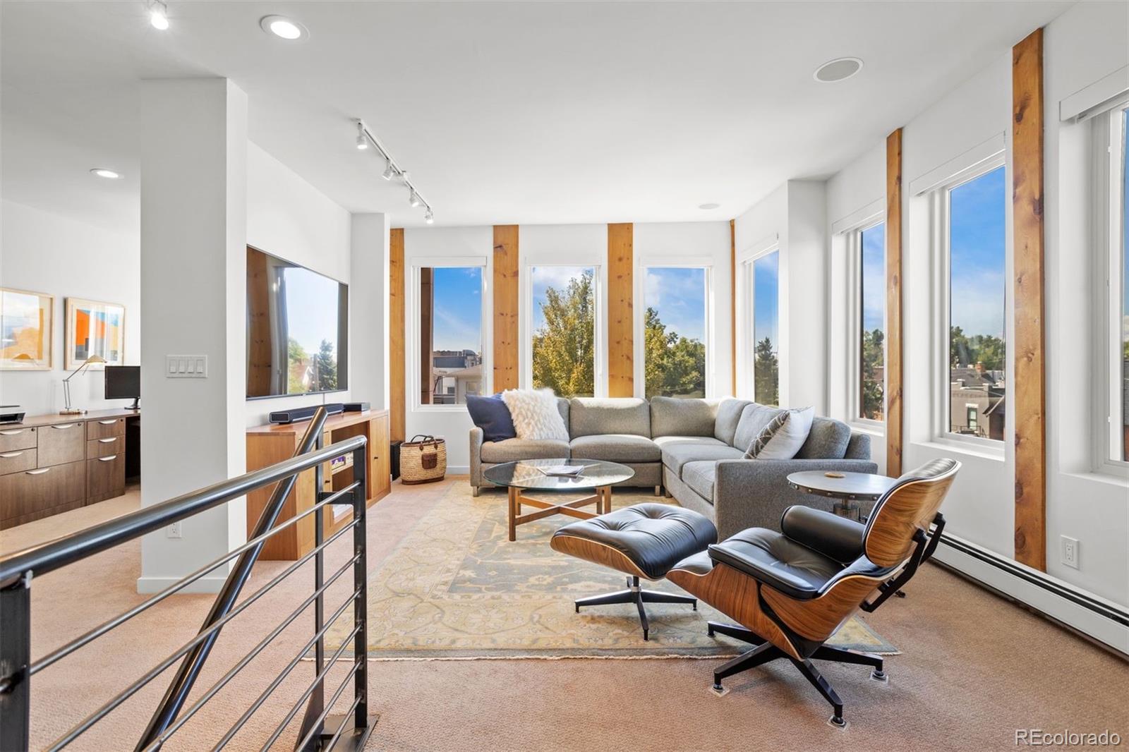3400 Tejon Street Denver, CO 80211 - Photo 16 of 40 a living room with furniture and a large window