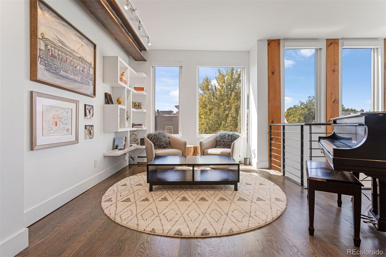 3400 Tejon Street Denver, CO 80211 - Photo 25 of 40 a living room with furniture and a large window