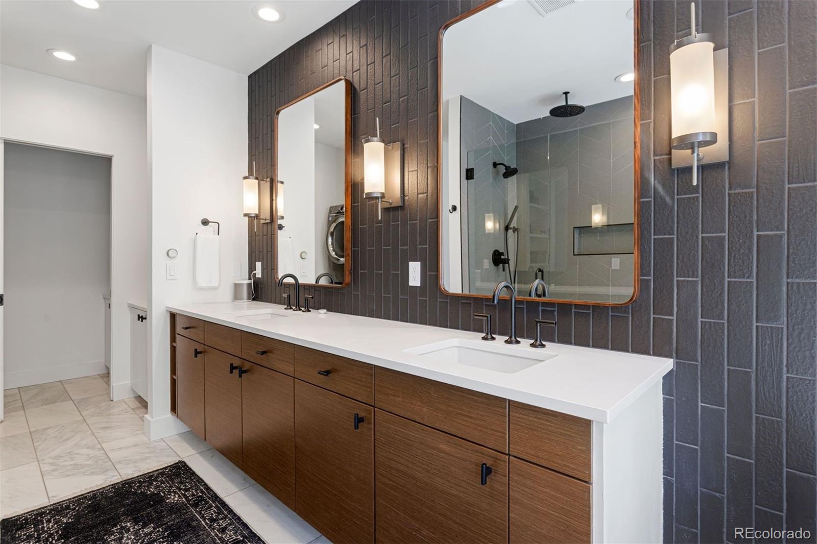 3400 Tejon Street Denver, CO 80211 - Photo 33 of 40 a bathroom with a double vanity sink and a mirror