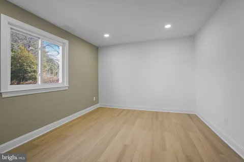 a view of room with window and closet