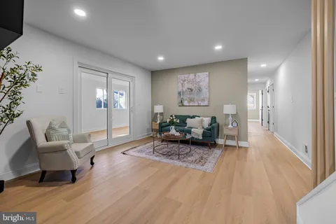 a living room with furniture and a couch