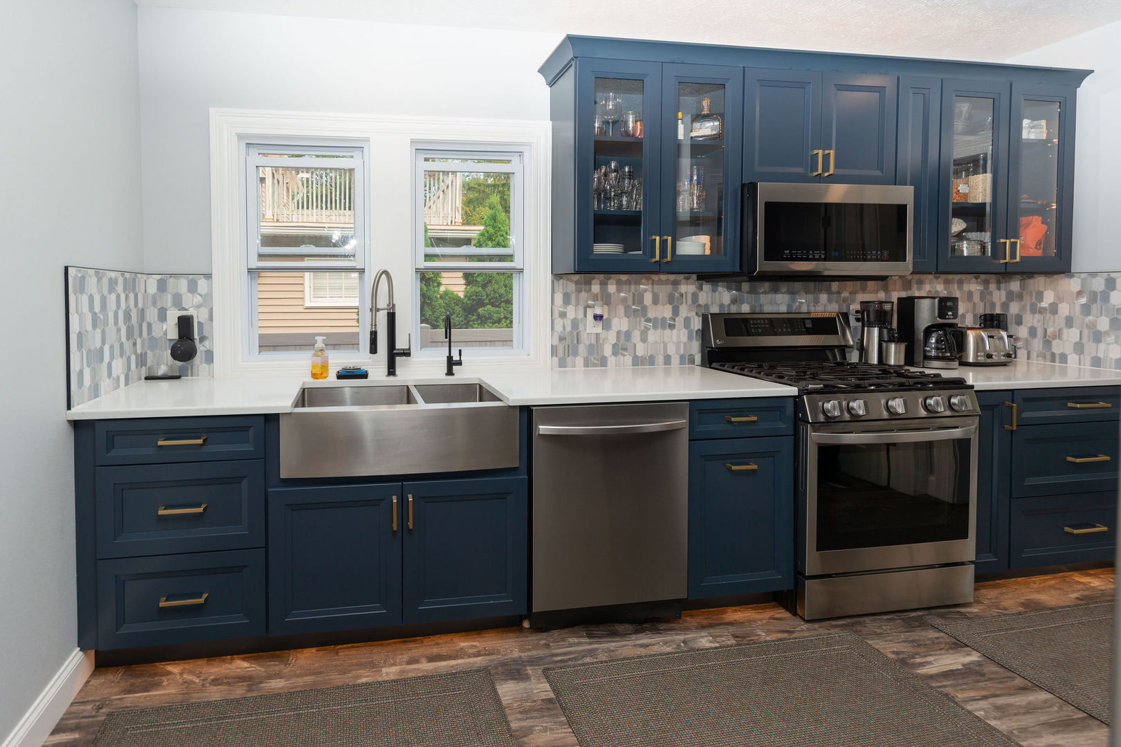 1719 Post Avenue Rockford, IL 61103 - Photo 18 of 52 a kitchen with a sink stove and microwave