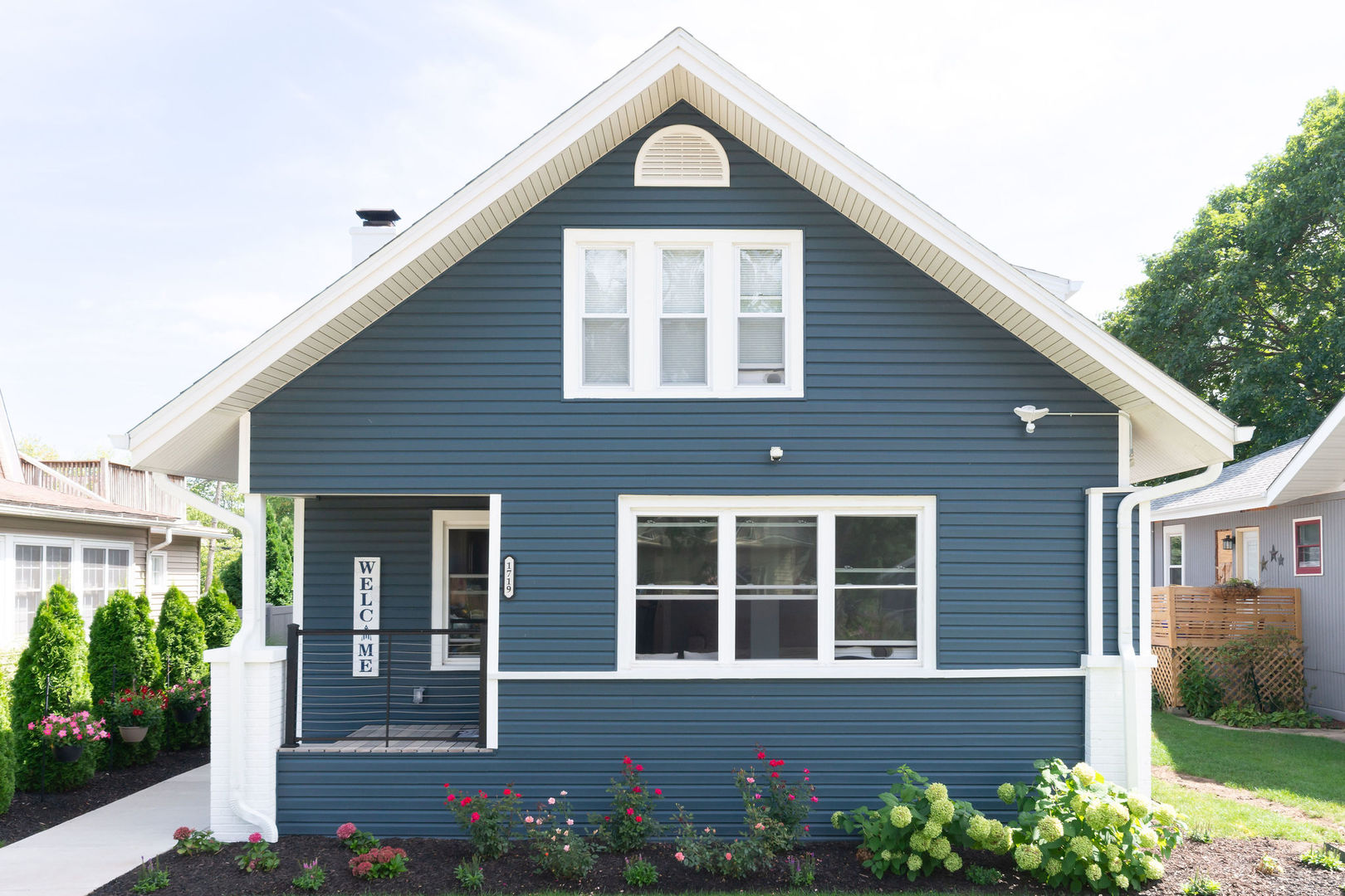 1719 Post Avenue Rockford, IL 61103 - Photo 2 of 52 a view of a brick house with large windows