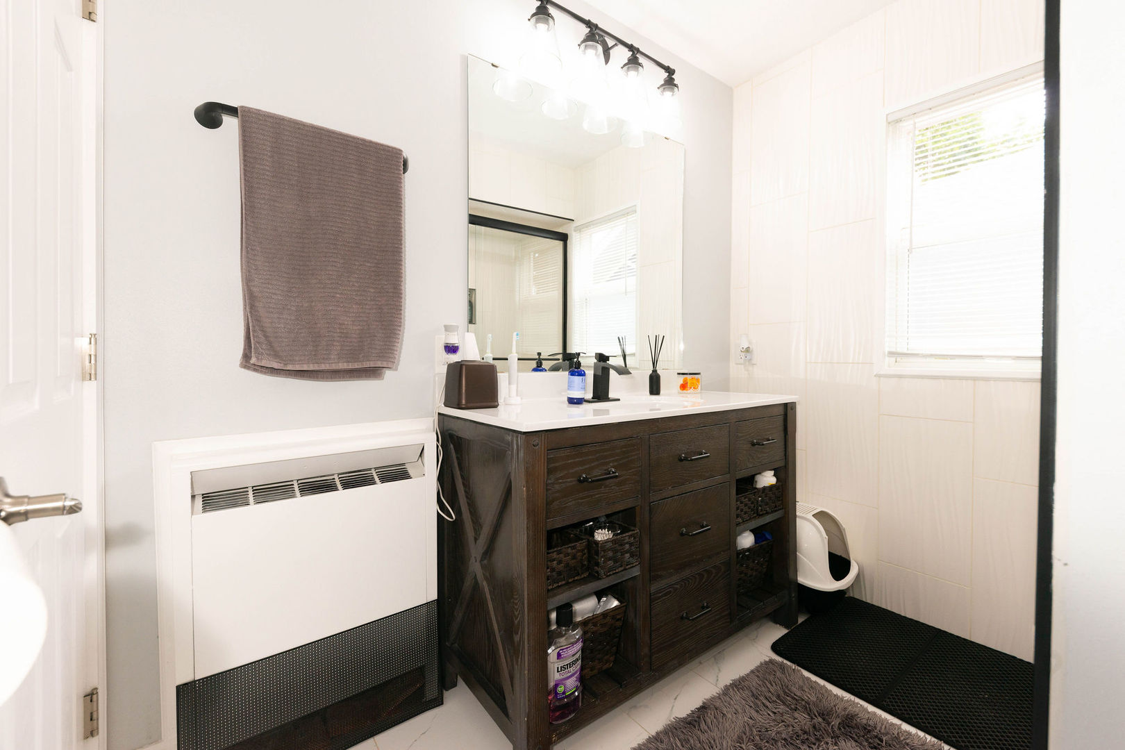 1719 Post Avenue Rockford, IL 61103 - Photo 23 of 52 a bathroom with a sink vanity and mirror