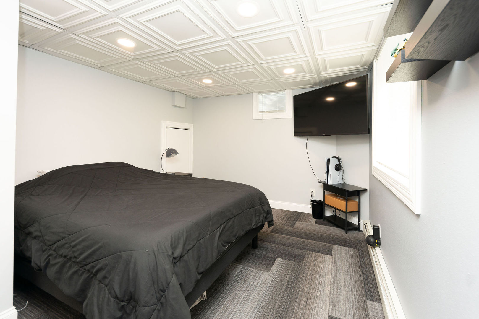 1719 Post Avenue Rockford, IL 61103 - Photo 29 of 52 a bedroom with a bed and flat screen tv