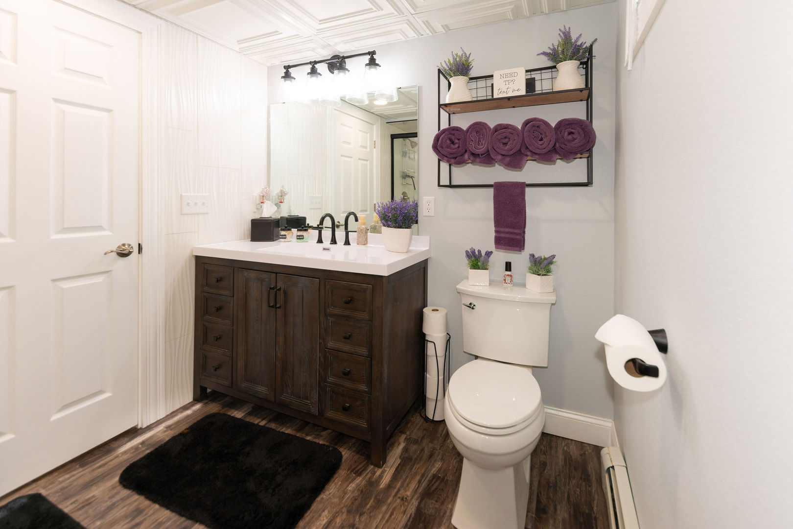 1719 Post Avenue Rockford, IL 61103 - Photo 31 of 52 a bathroom with a toilet a sink and mirror