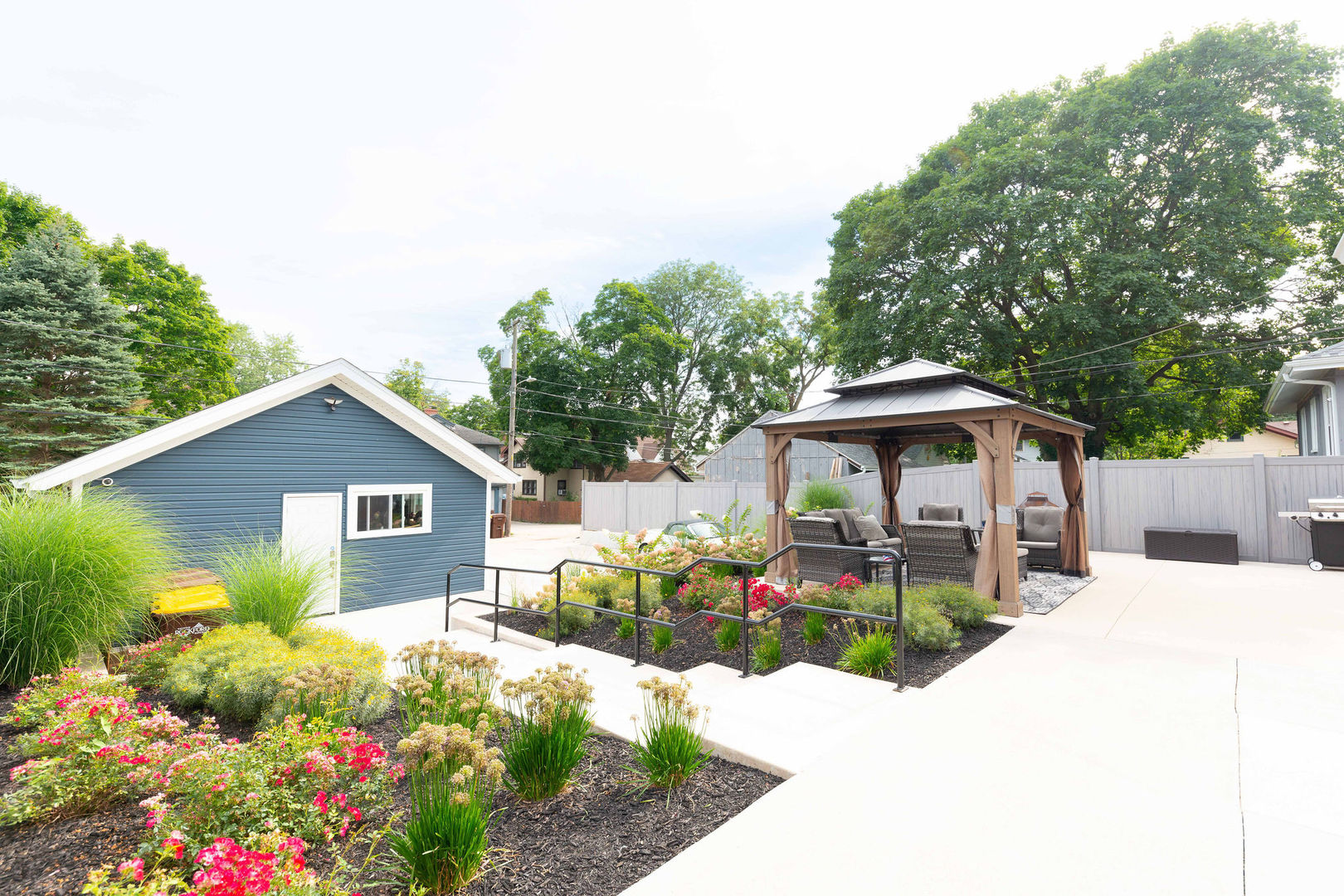 1719 Post Avenue Rockford, IL 61103 - Photo 40 of 52 a view of a house with a yard and garden