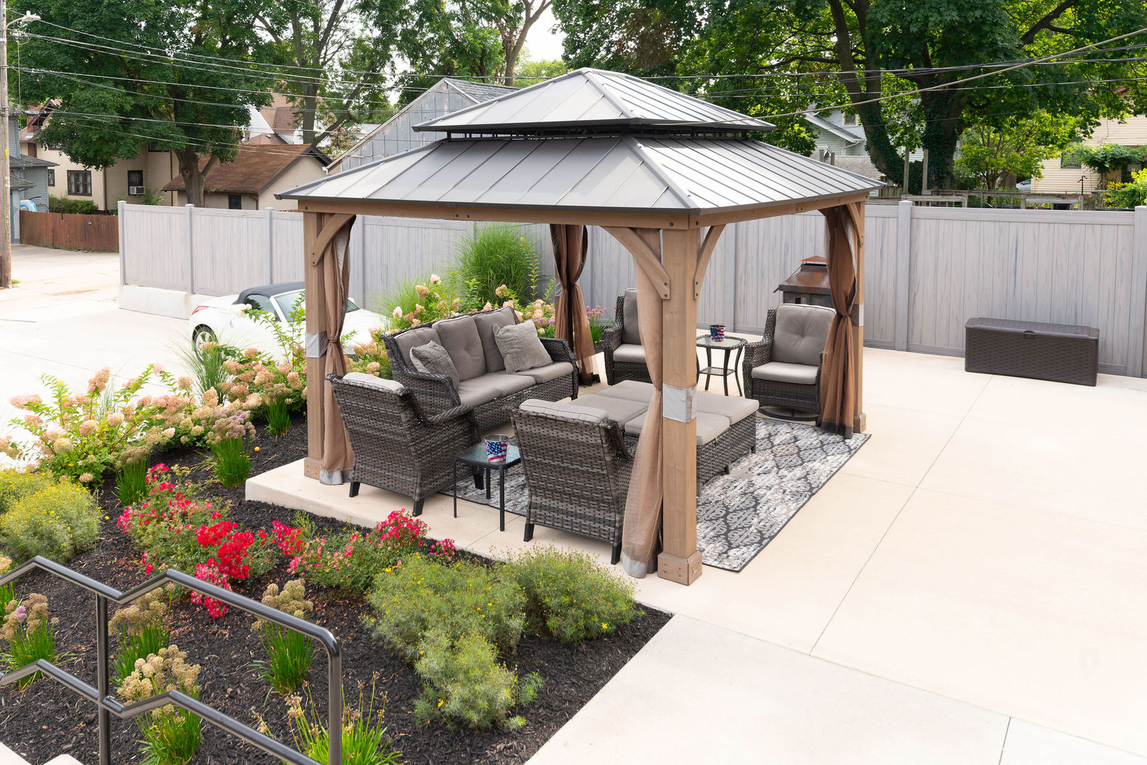 1719 Post Avenue Rockford, IL 61103 - Photo 41 of 52 a view of a patio with table and chairs under an umbrella