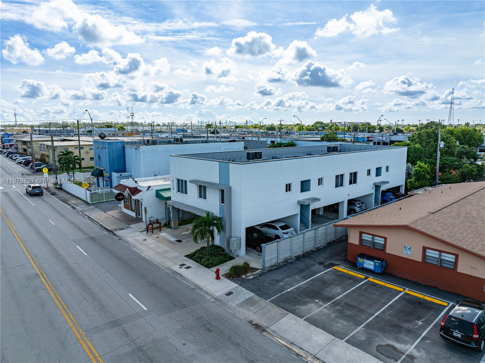 620 West 29th Street Hialeah, FL 33012 - Photo 2 of 26 an aerial view of a house with patio kitchen and mountain view in back