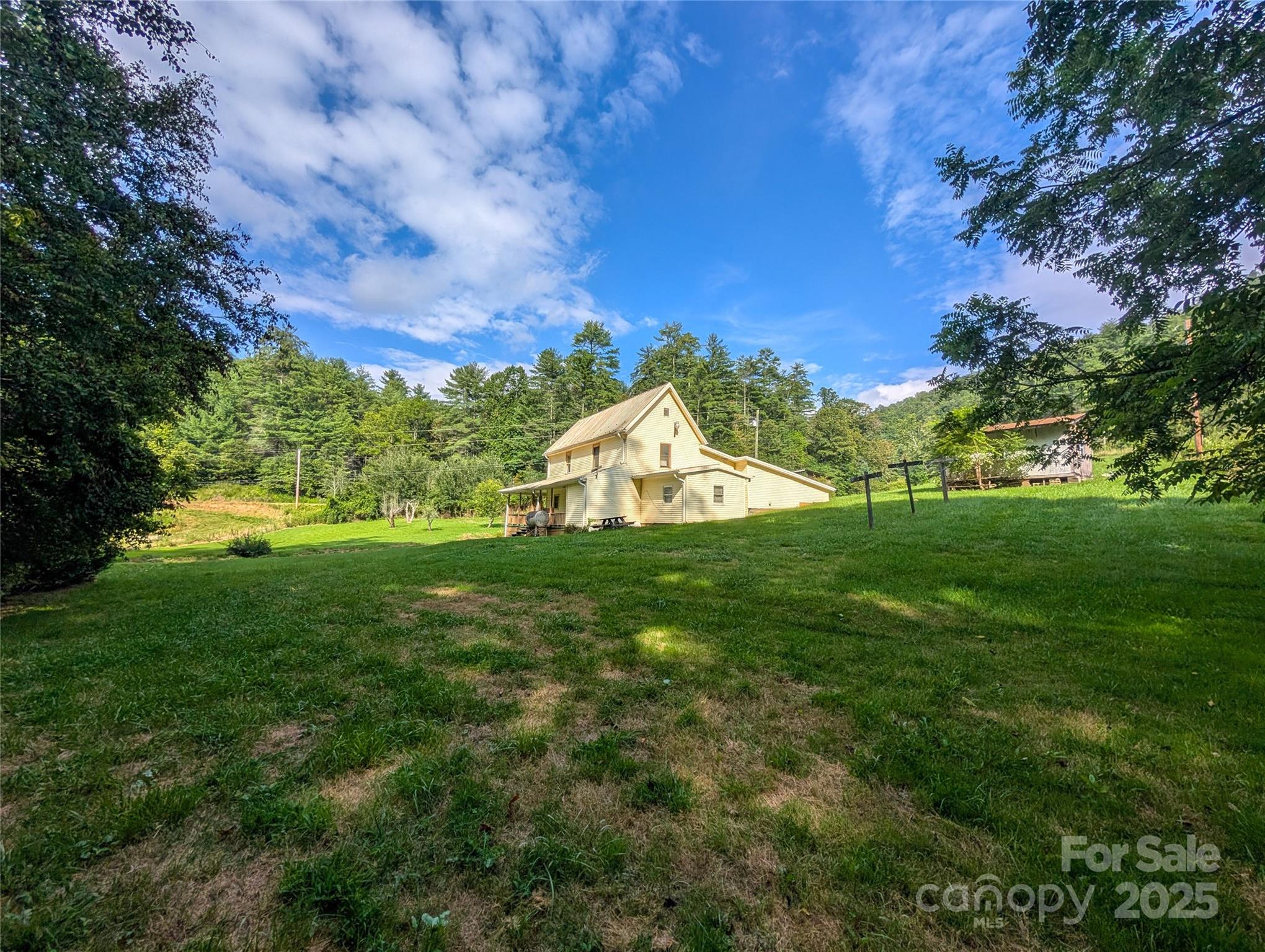 540 Pound Mill Branch Road Burnsville, NC 28714 - Photo 13 of 43 a view of a garden