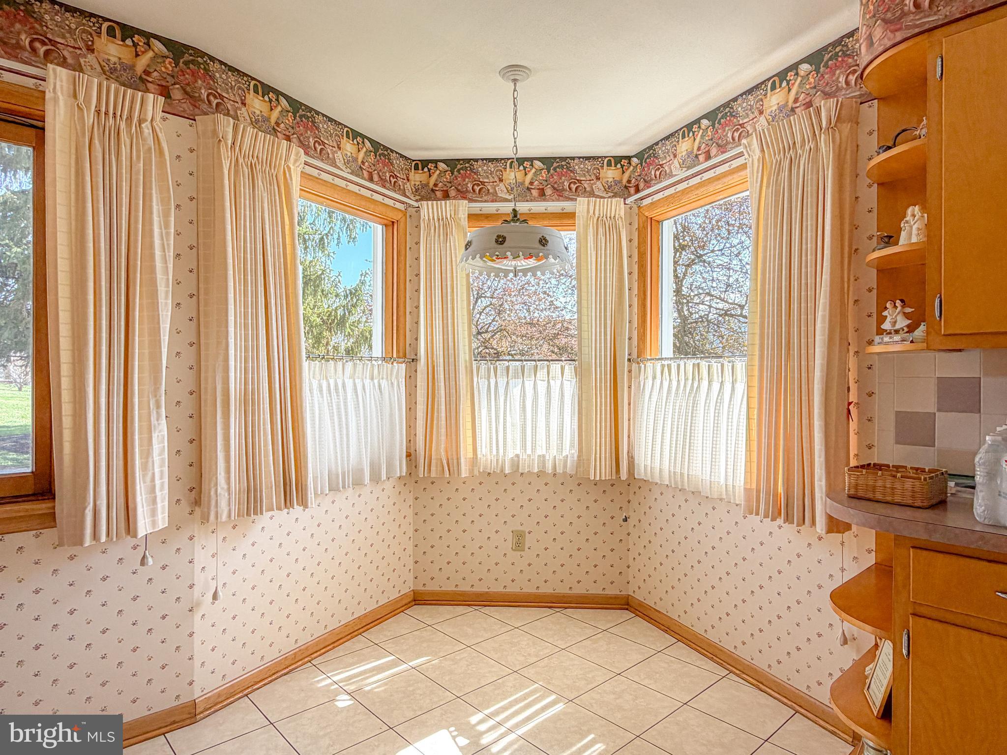 1771 Upper Snake Spring Road Everett, PA 15537 - Photo 5 of 62 Breakfast nook area with all around natural light