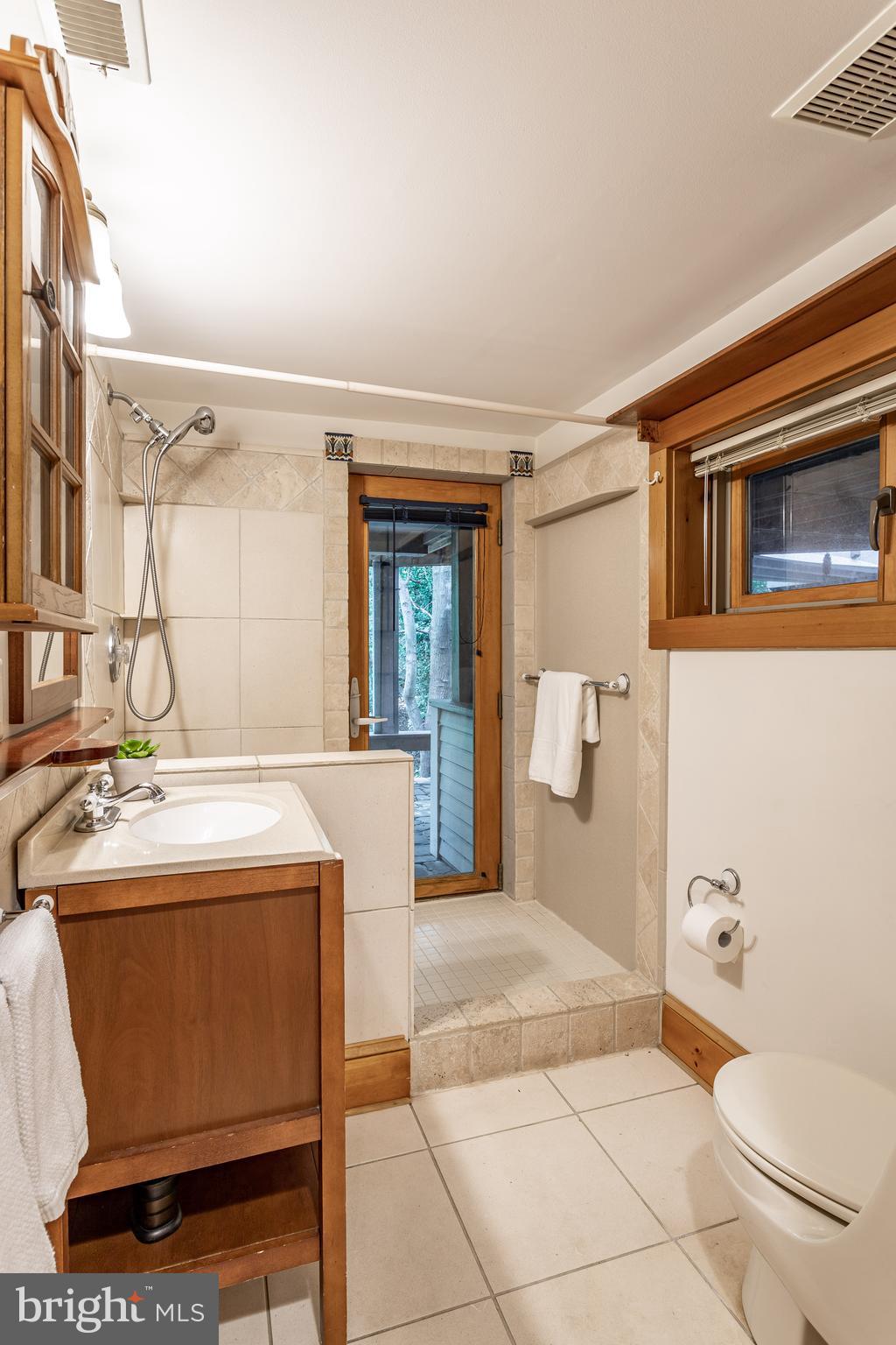 2319 Hickory Road Annapolis, MD 21401 - Photo 41 of 68 Lower level full bath has walk out to deck.